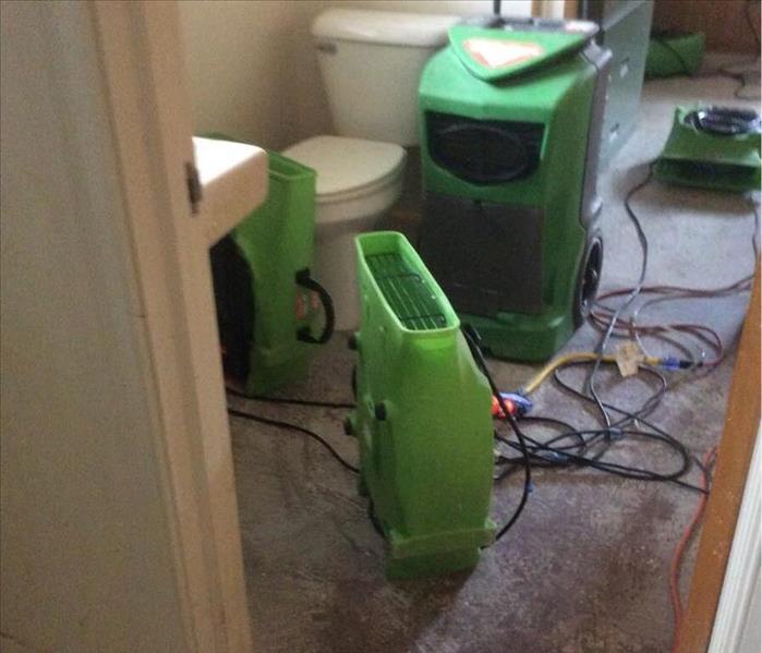 Air movers in bathroom of home