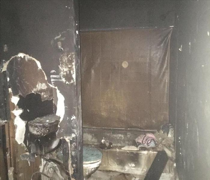 This photo shows the entire bathroom after an electrical fire pre mitigation