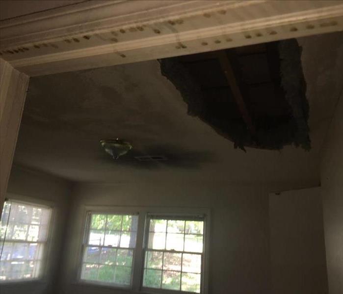 Ceiling of a Greenville, SC bedroom after a fire started in the upstairs bathroom