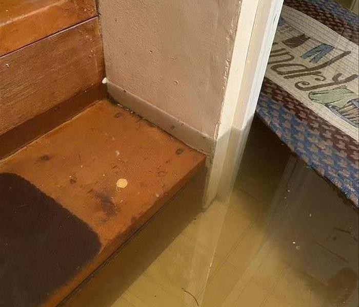 Water flooded around staircase