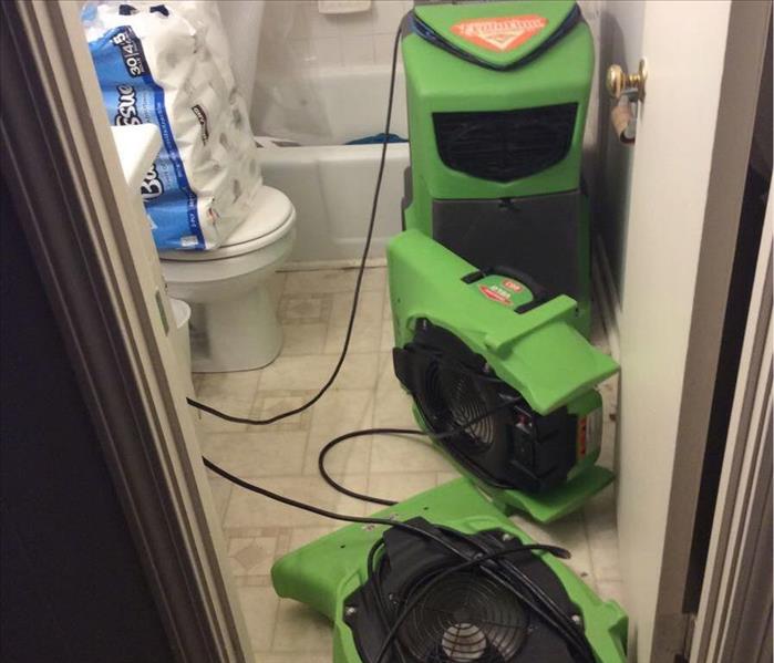 Air movers on the floor of a bathroom in Greenville, SC