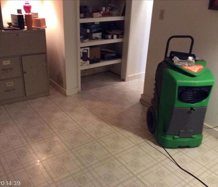 Dehumidifier on kitchen floor in a Greenville, SC home