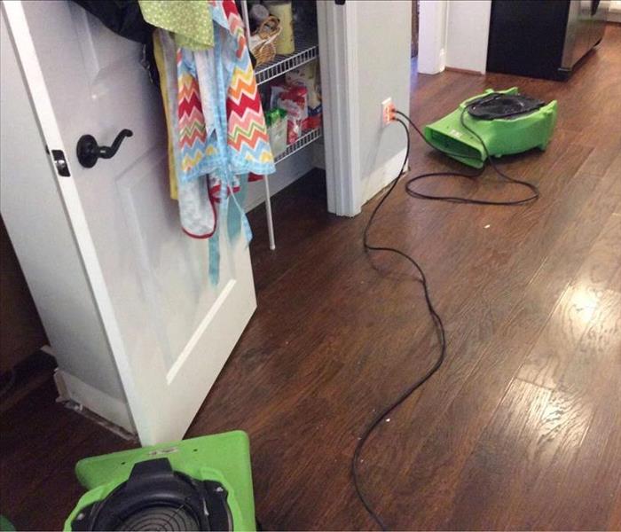 Air movers in kitchen facing pantry